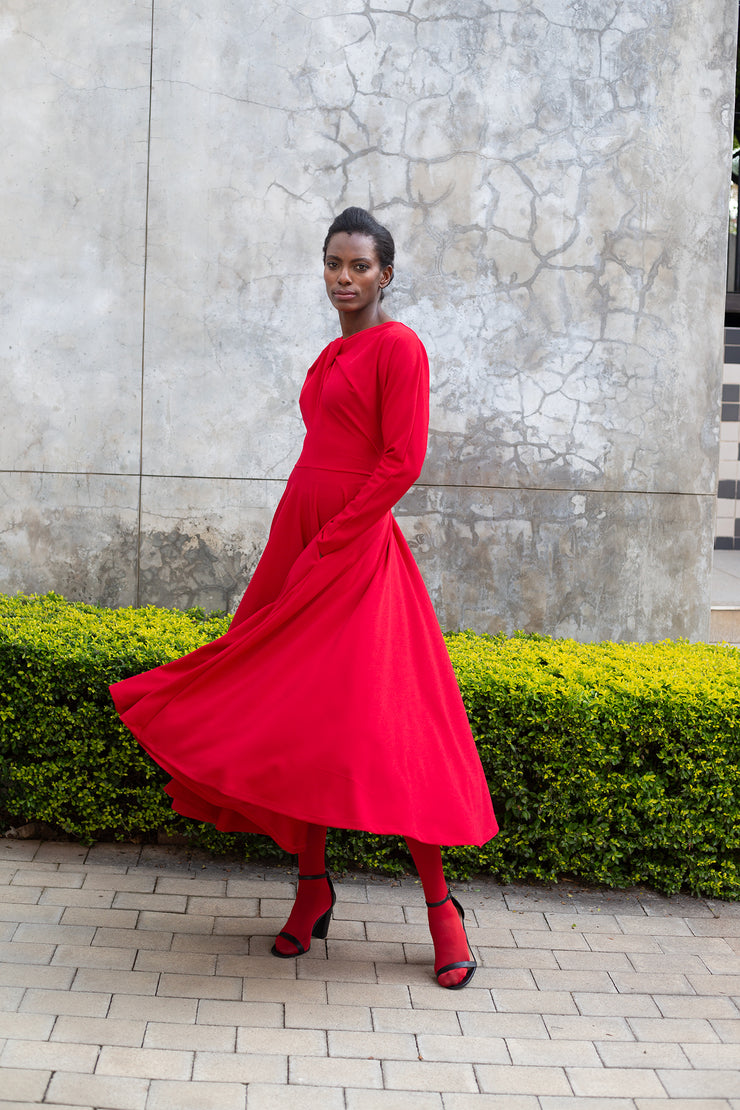circle midi dress Light blue midi dress with circle skirts. Golden color detail in neckl GUNTINA