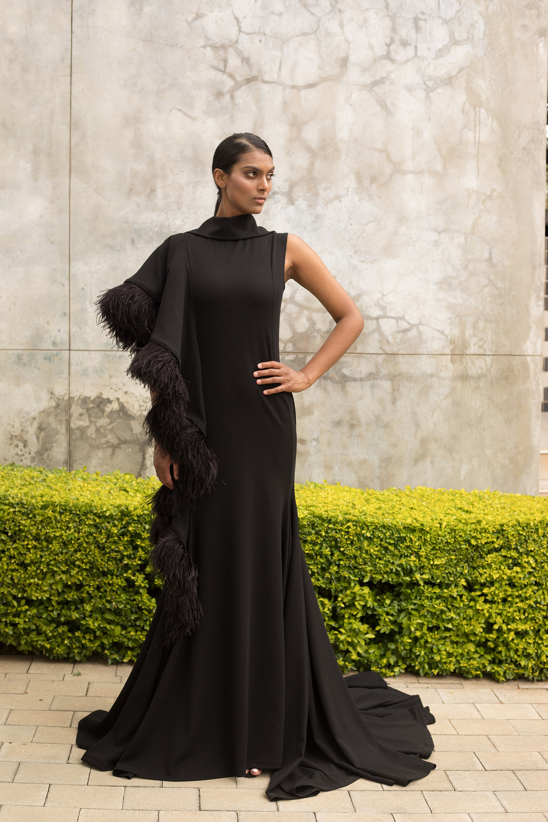 dinner dress of black worsted wool crepe with ostrich feathers