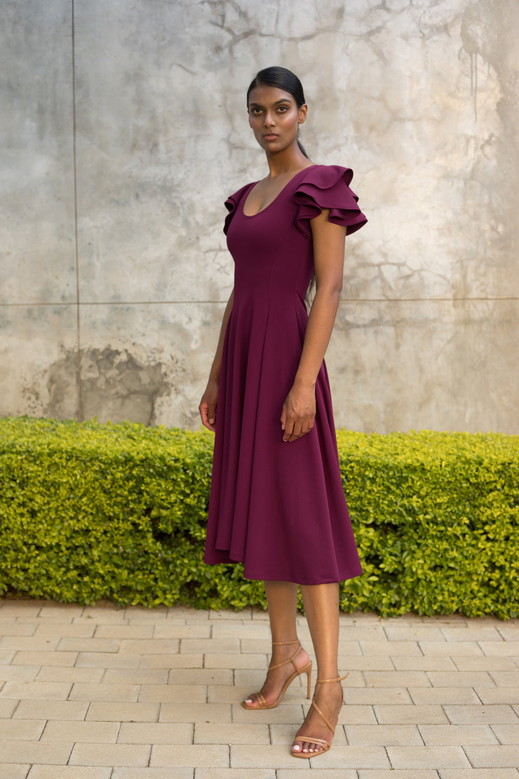 Grape Flutter Sleeve Fit and Flare Dress - Midi length ERRE Fashion Grape Flutter Sleeve Fit and Flare Dress - Midi length ERRE Fashion